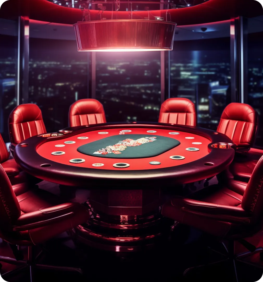 A red poker table with leather chairs overlooking a city skyline at night