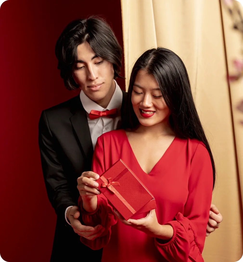 A stylish couple celebrating together, illustrating high-converting Dating traffic