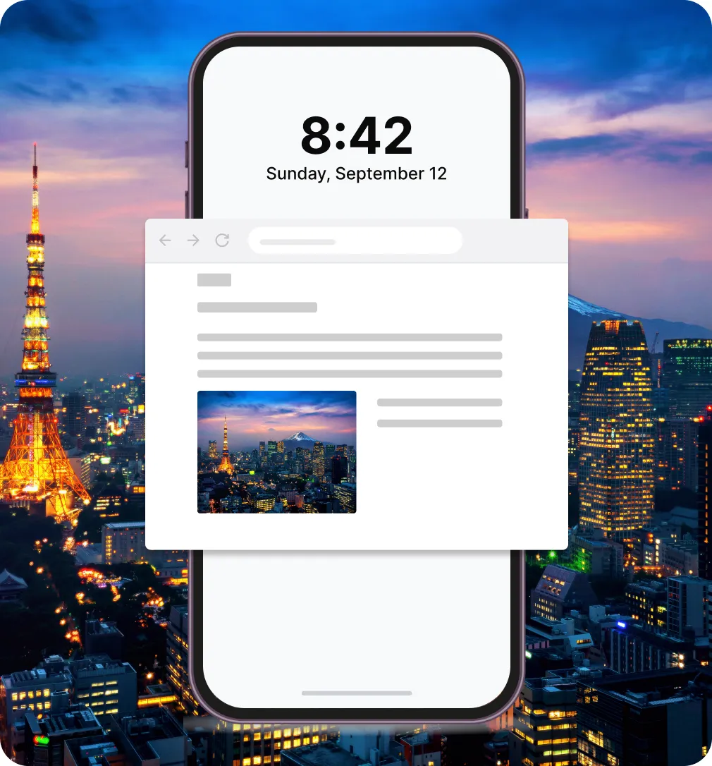 A popunder ad on a phone over a city skyline at night